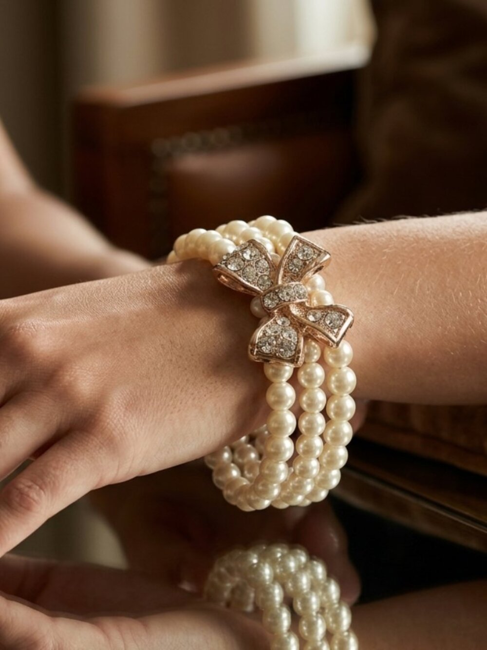 Three-Strand Pearl Bracelet with Crystal Bow Center - Picture 3 of 6